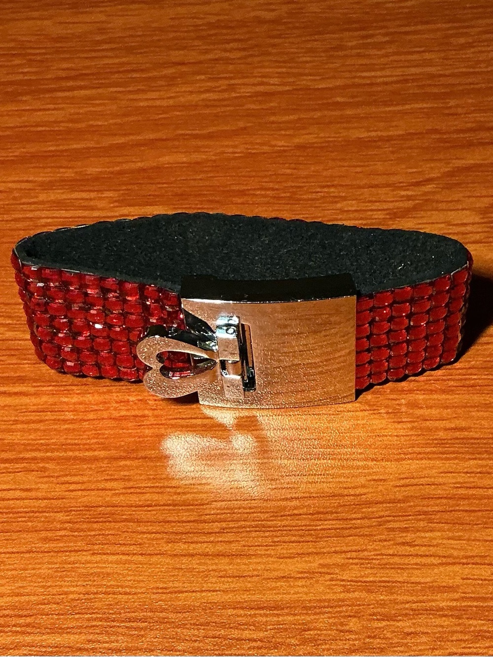 Red Rhinestone cuff Bracelet with Silver heart clasp. Black liner bracelet.